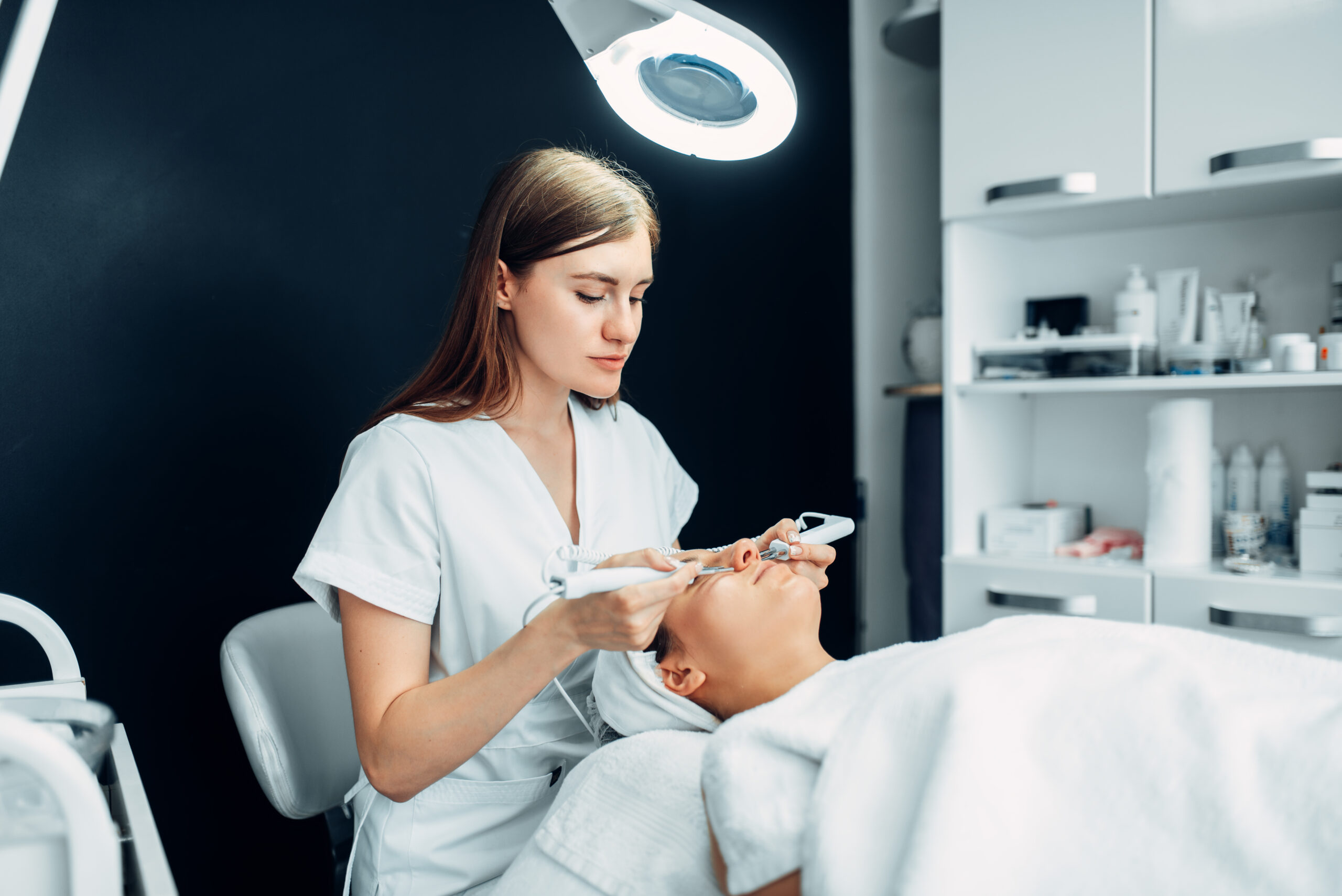Woman receiving a facial treatment at Dao Ki
